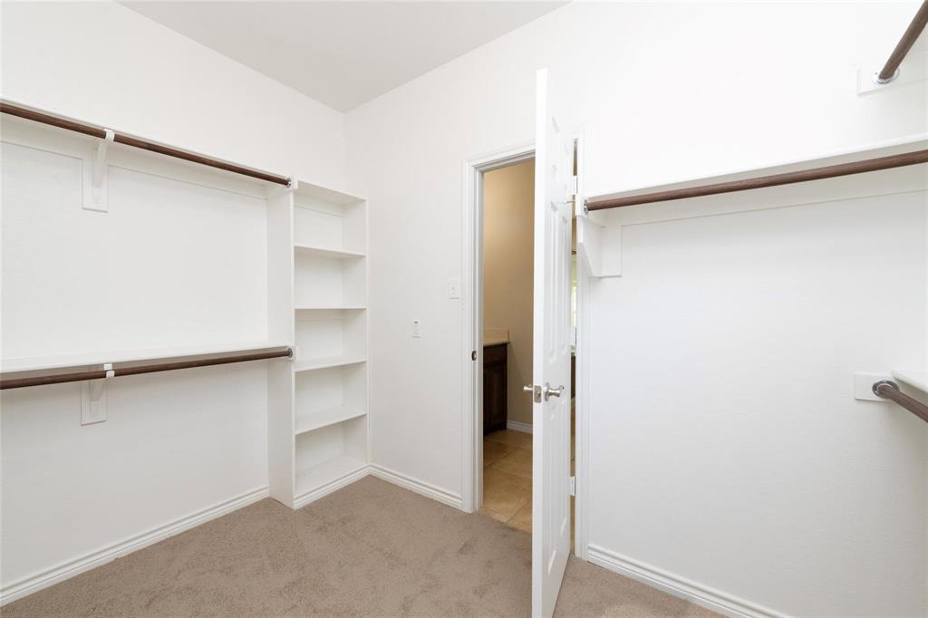 425 Windward Drive Murphy, TX 75094 - Photo 17 of 31 a view of an empty walk in closet