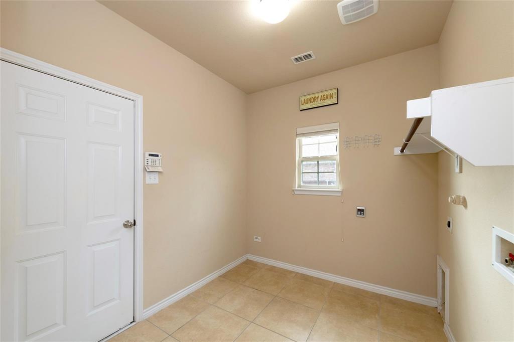 425 Windward Drive Murphy, TX 75094 - Photo 21 of 31 a view of an empty room with windows