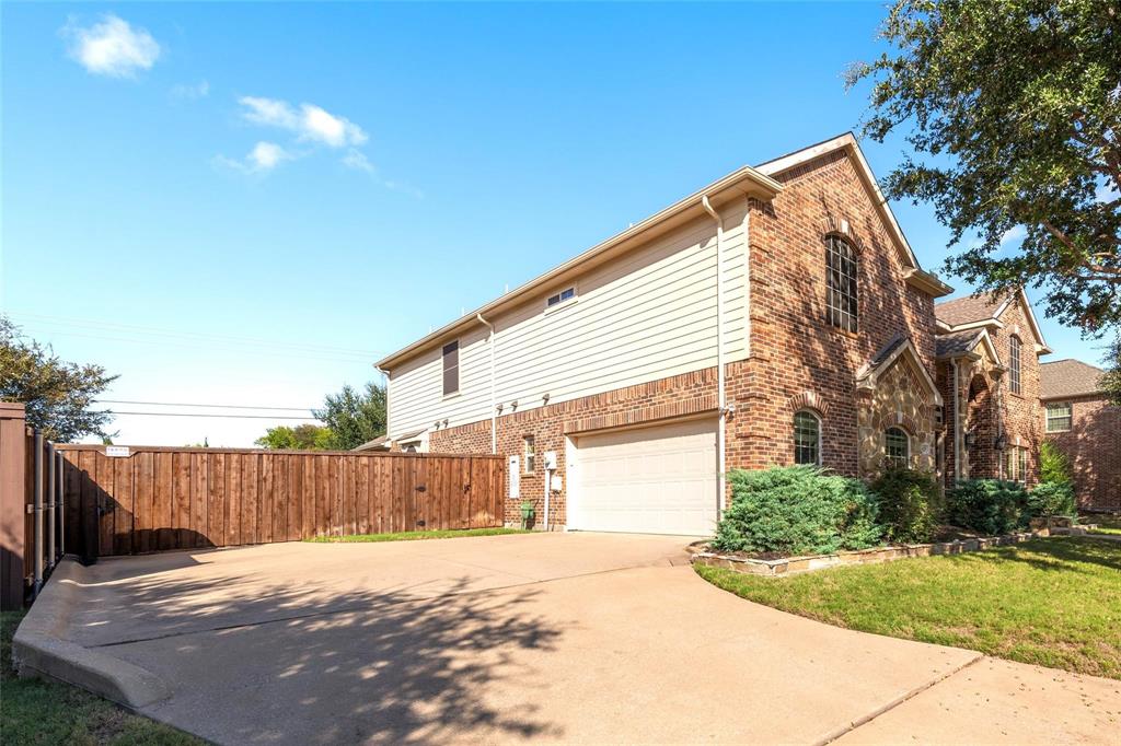 425 Windward Drive Murphy, TX 75094 - Photo 8 of 31 a backyard of a house