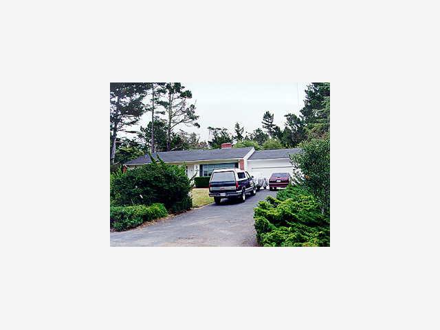 3059 Larkin Road Pebble Beach, CA 93953 - Photo 1 of 1 a picture of a bench in front of a house