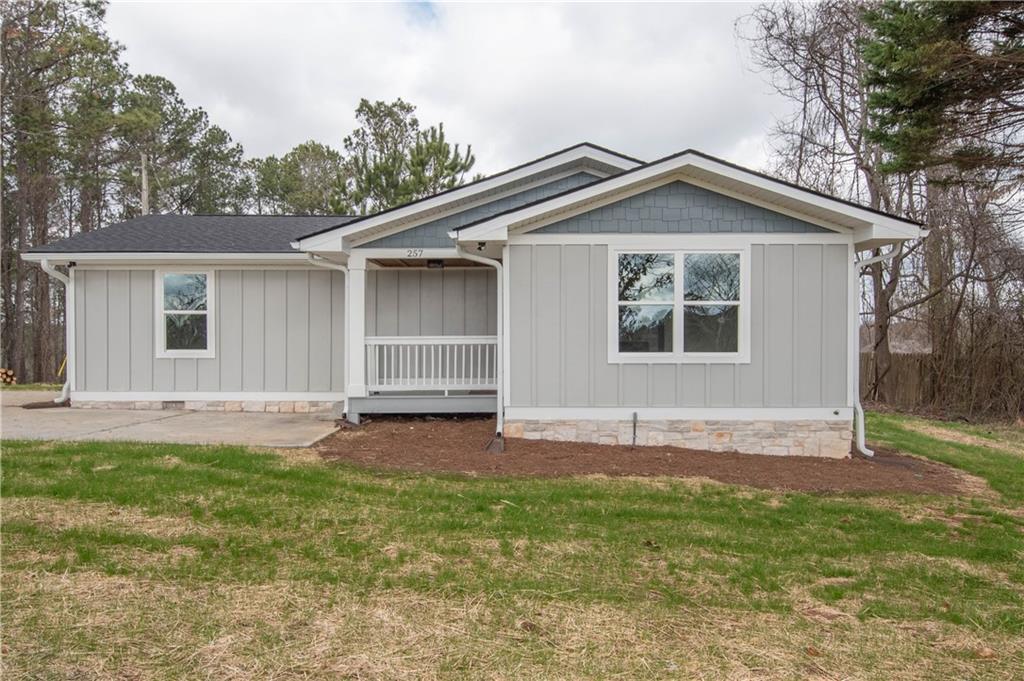 257 Kelly Farm Road Newnan, GA 30265 - Photo 1 of 1 a view of a house with a yard