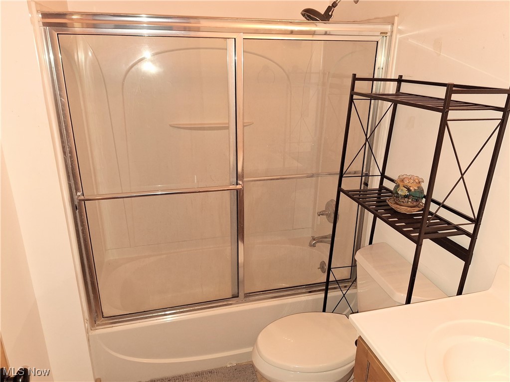 587 North Fork Road Wheeling, WV 26003 - Photo 5 of 35 Bathroom with vanity, toilet, and enclosed tub / shower combo