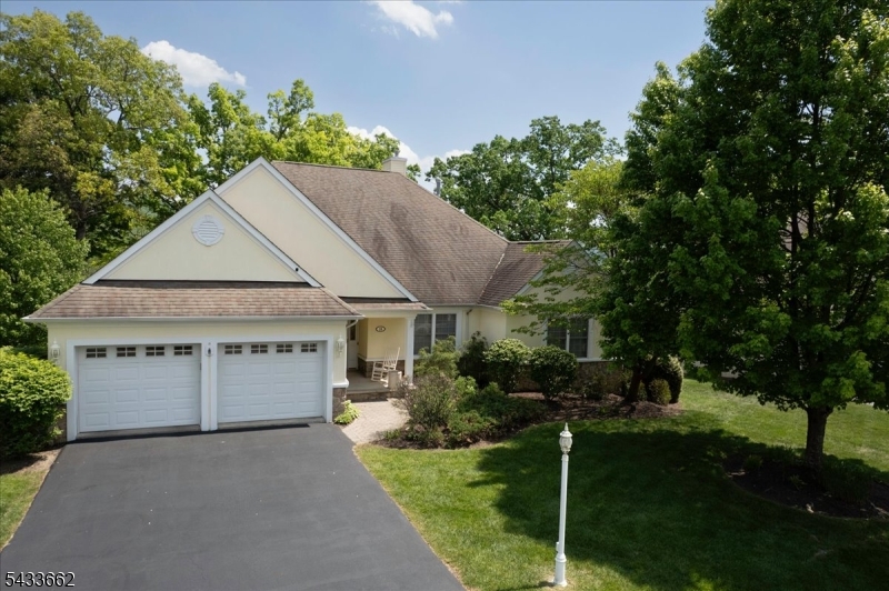 15 Bracken Hill Road Hamburg, NJ 07419 - Photo 41 of 44 a house with green field in front of it