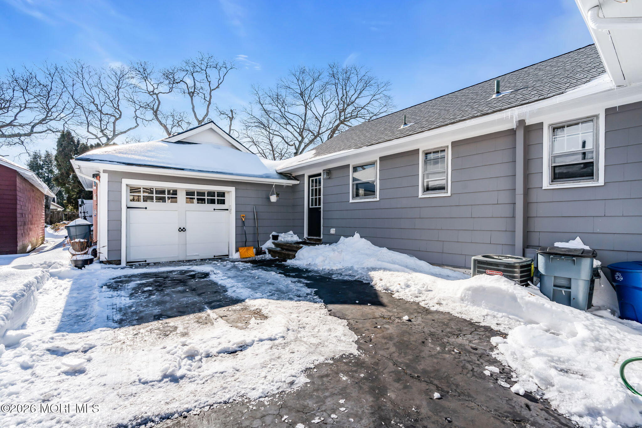 712 McLean Avenue Point Pleasant Beach, NJ 08742 - Photo 12 of 48 a view of a house with snow on the road