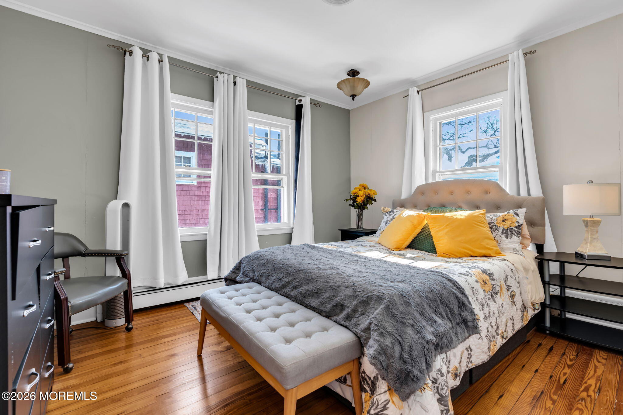712 McLean Avenue Point Pleasant Beach, NJ 08742 - Photo 5 of 48 a bedroom with a bed and wooden floor