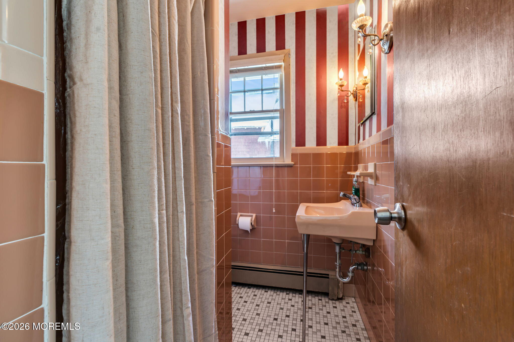 712 McLean Avenue Point Pleasant Beach, NJ 08742 - Photo 7 of 48 a bathroom with a sink a toilet and mirror