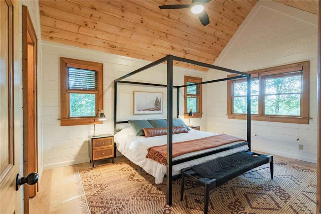 140 Black Oaks Road Cherry Log, GA 30522 - Photo 18 of 85 a bedroom with a bed and a window