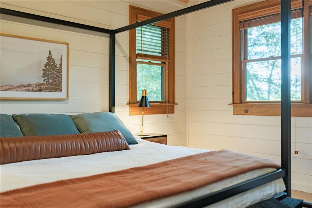 140 Black Oaks Road Cherry Log, GA 30522 - Photo 19 of 85 a bedroom with a bed and a window with the outer view