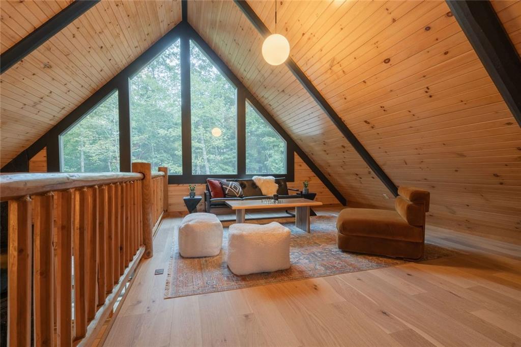 140 Black Oaks Road Cherry Log, GA 30522 - Photo 25 of 85 a living room with furniture and a large window