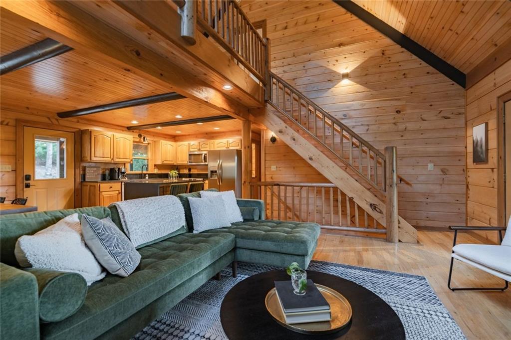 140 Black Oaks Road Cherry Log, GA 30522 - Photo 3 of 85 a living room with furniture and wooden floor