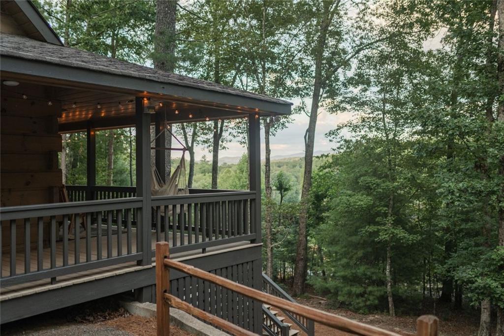 140 Black Oaks Road Cherry Log, GA 30522 - Photo 46 of 85 a view of backyard with green space and balcony