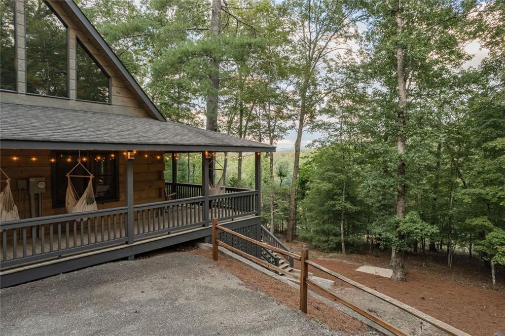 140 Black Oaks Road Cherry Log, GA 30522 - Photo 48 of 85 a view of backyard with deck and wooden floor
