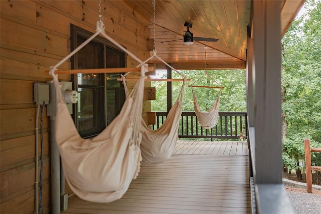 140 Black Oaks Road Cherry Log, GA 30522 - Photo 50 of 85 a view of a porch with wooden floor and outdoor space