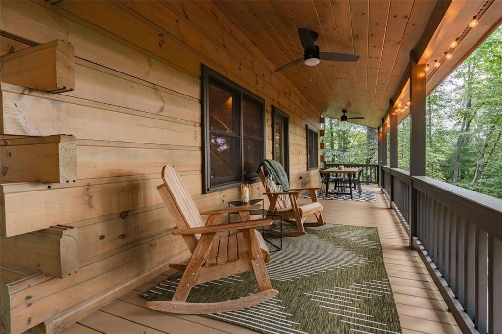 140 Black Oaks Road Cherry Log, GA 30522 - Photo 52 of 85 a view of a patio with table and chairs