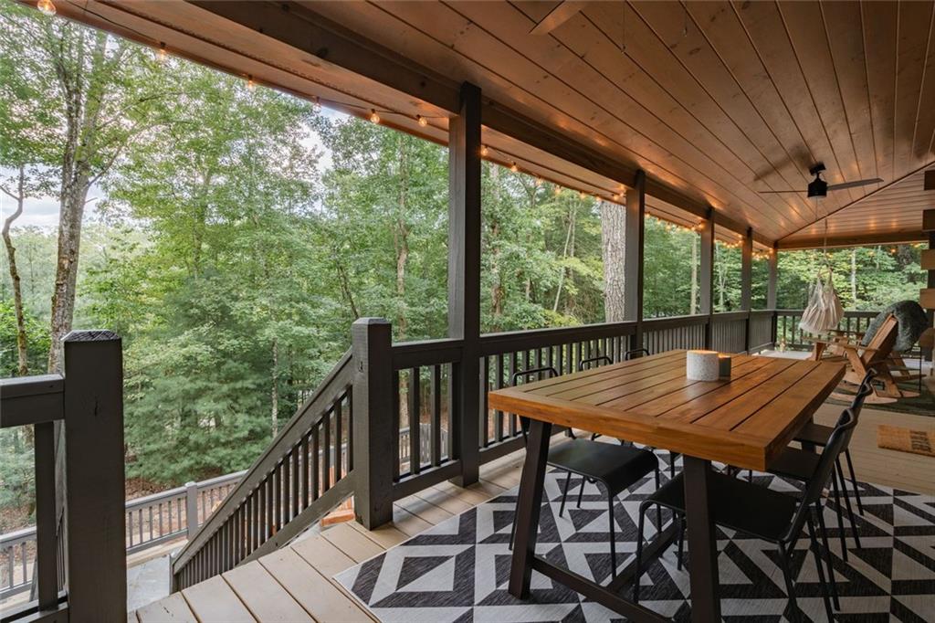 140 Black Oaks Road Cherry Log, GA 30522 - Photo 53 of 85 a view of a patio with a table chairs and a table