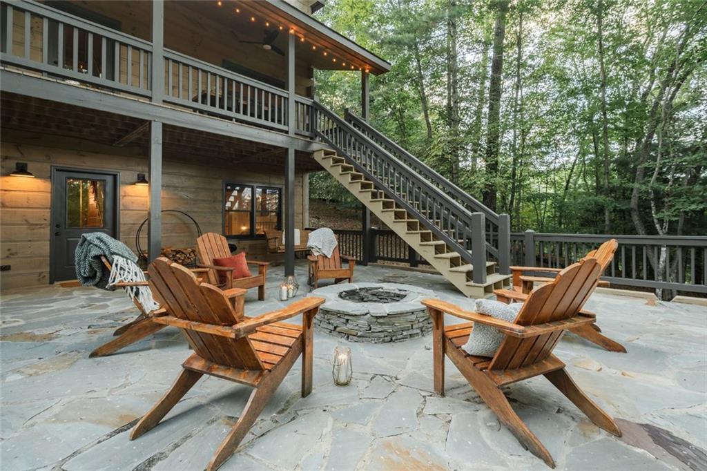 140 Black Oaks Road Cherry Log, GA 30522 - Photo 65 of 85 a view of a chairs and tables in the balcony
