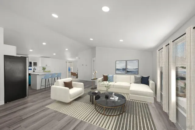 a living room with furniture and a table