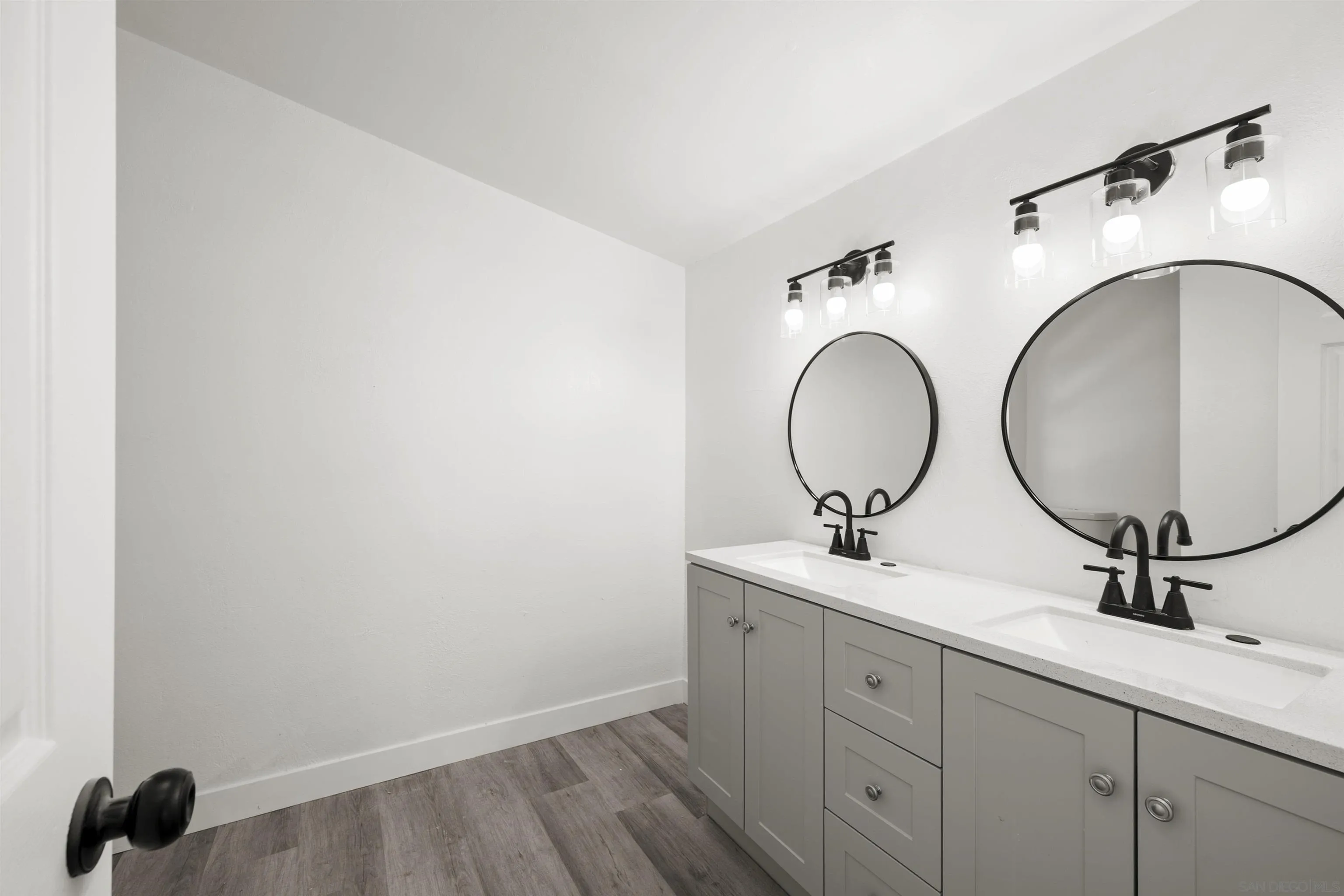 10767 Jamacha Boulevard, Unit SPC 62 Spring Valley, CA 91978 - Photo 13 of 25 a bathroom with a sink and a mirror