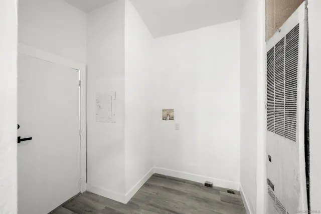 a view of small space with wooden floor