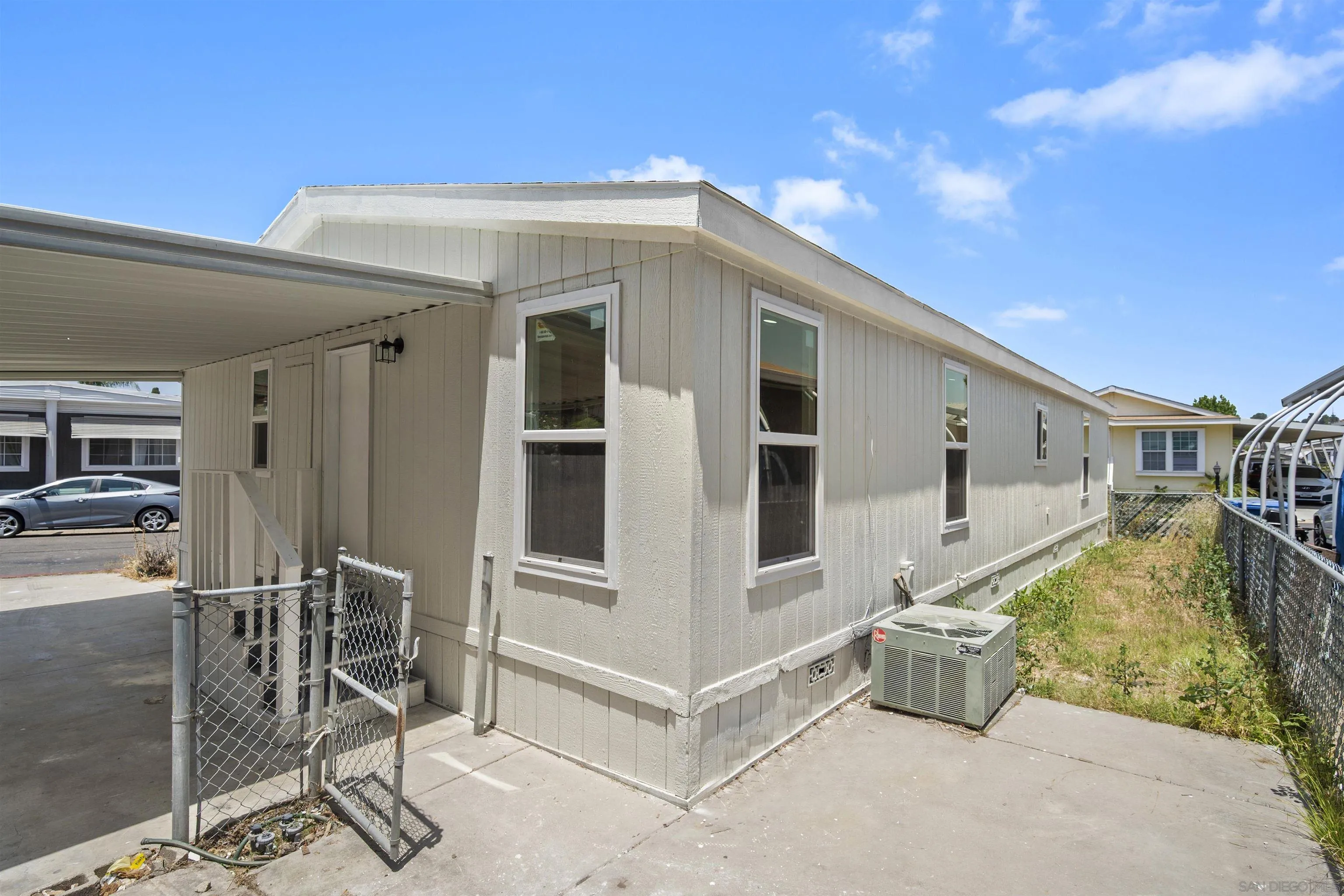 10767 Jamacha Boulevard, Unit SPC 62 Spring Valley, CA 91978 - Photo 23 of 25 a view of a house with backyard and sitting area