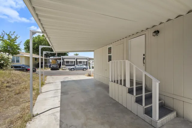 a view of a house with swimming pool