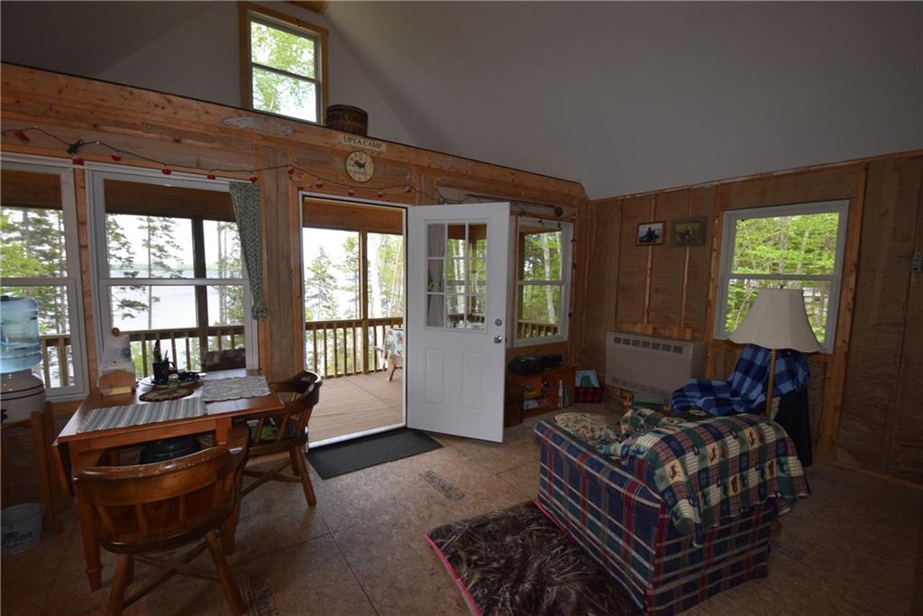321 Boulder Road Danforth, ME 04424 - Photo 12 of 30 Living room, kitchen area with...