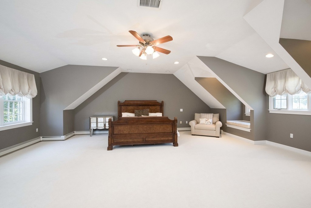 77 High Pines Drive Kingston, MA 02364 - Photo 16 of 28 a living room with furniture and a chandelier