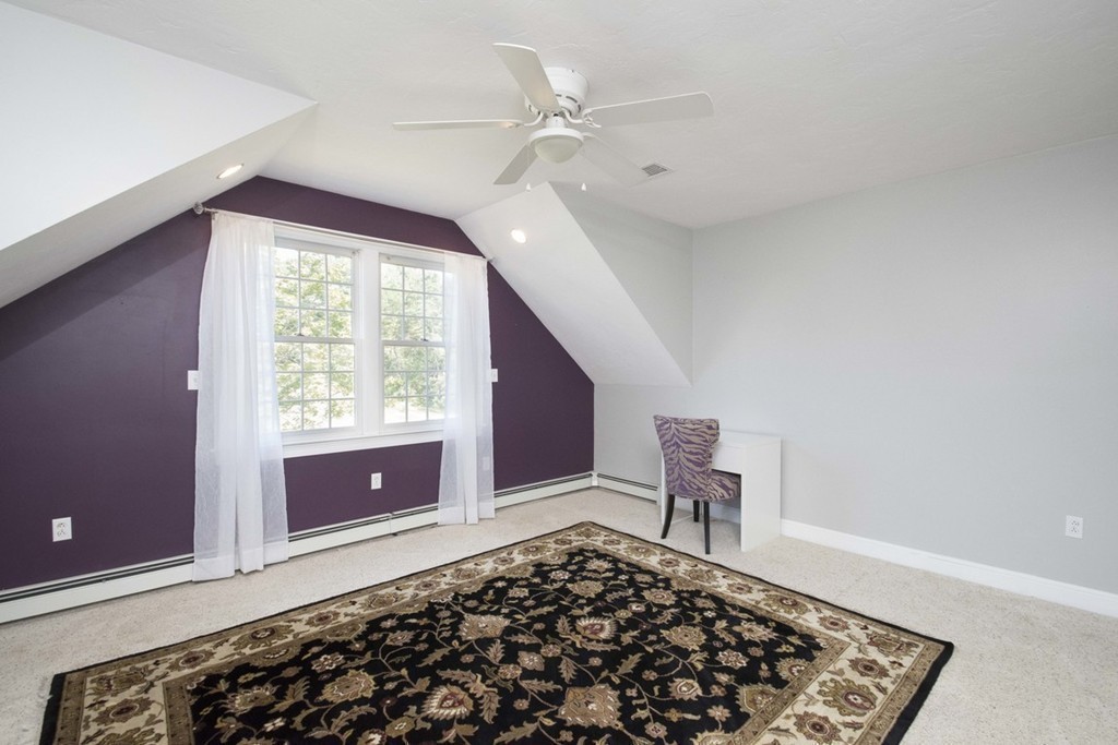 77 High Pines Drive Kingston, MA 02364 - Photo 21 of 28 a living room with a couch and a rug