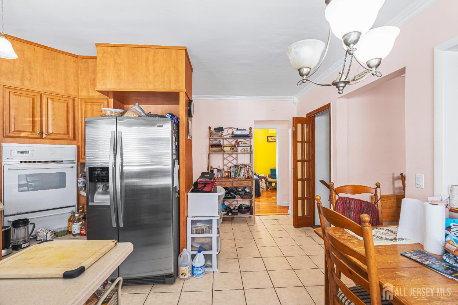 305 Penfield Place Dunellen, NJ 08812 - Photo 11 of 53 a kitchen with stainless steel appliances granite countertop a sink refrigerator and microwave