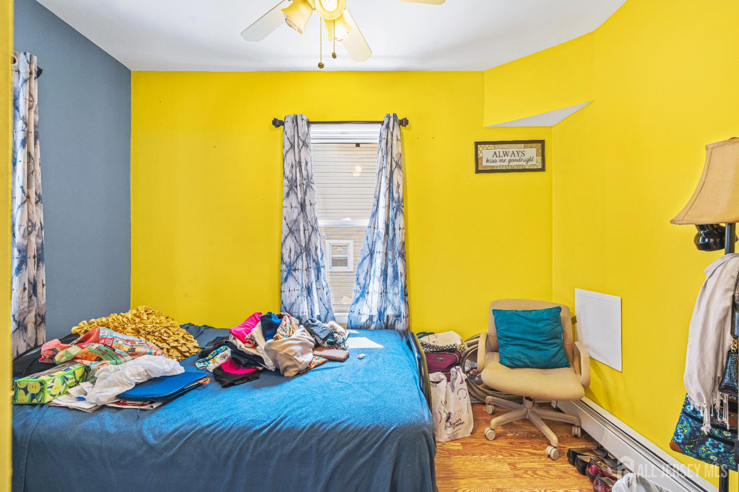 305 Penfield Place Dunellen, NJ 08812 - Photo 17 of 53 a bedroom with bed and a window