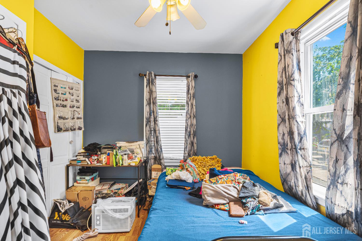 305 Penfield Place Dunellen, NJ 08812 - Photo 18 of 53 a living room with furniture and a window
