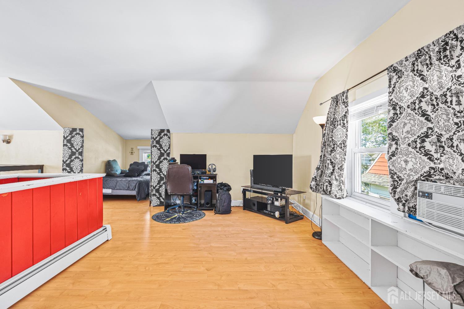 305 Penfield Place Dunellen, NJ 08812 - Photo 23 of 53 a living room with furniture and a flat screen tv