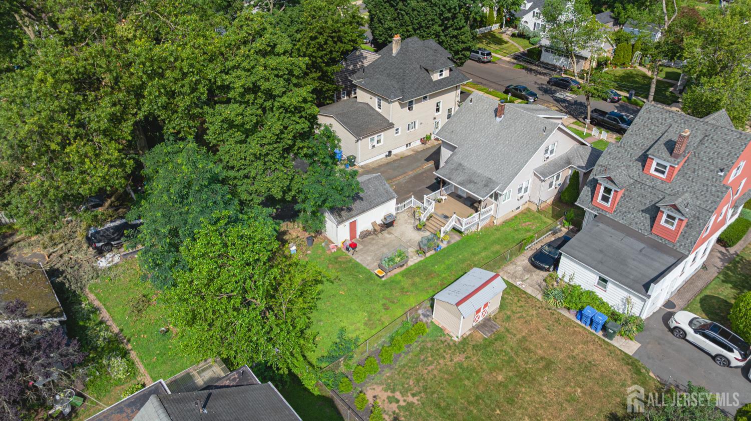 305 Penfield Place Dunellen, NJ 08812 - Photo 44 of 53 an aerial view of residential house with outdoor space and parking