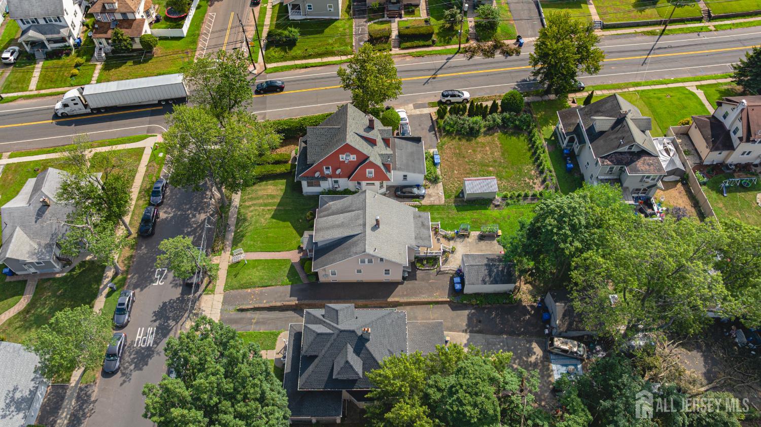 305 Penfield Place Dunellen, NJ 08812 - Photo 47 of 53 an aerial view of a house with a garden