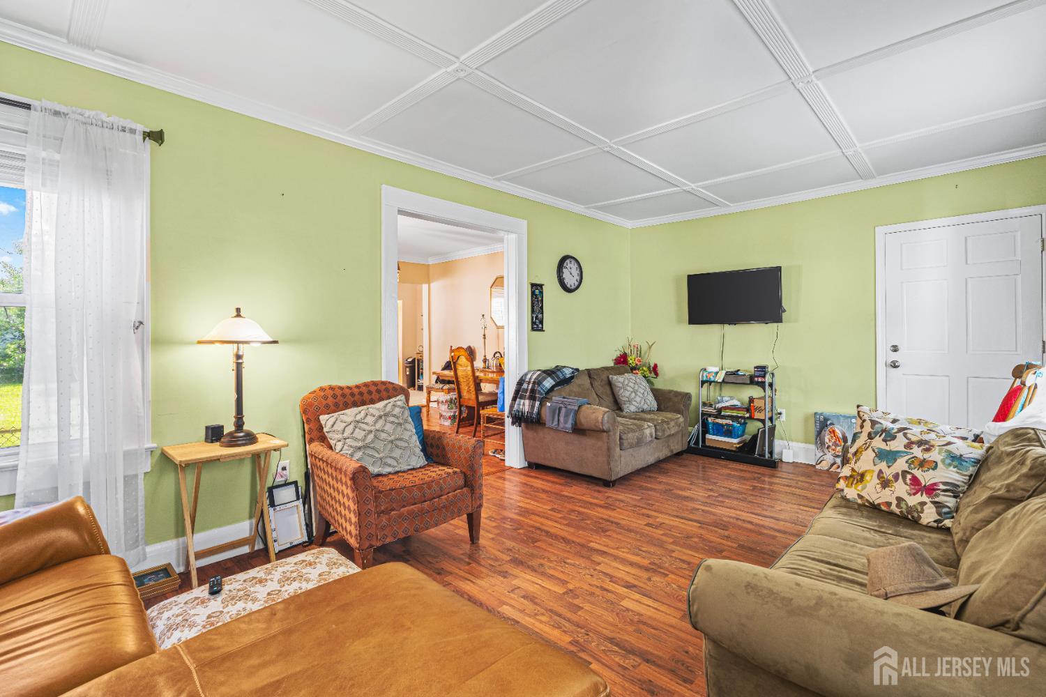 305 Penfield Place Dunellen, NJ 08812 - Photo 6 of 53 a living room with furniture and a flat screen tv