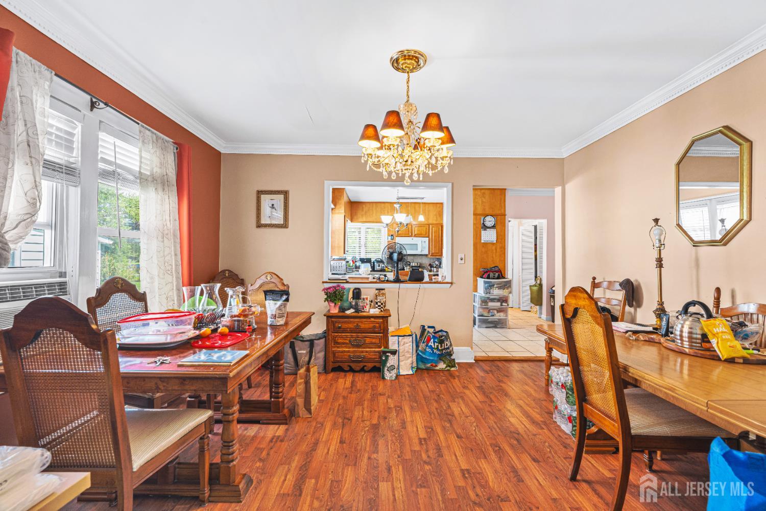 305 Penfield Place Dunellen, NJ 08812 - Photo 7 of 53 a outdoor dining room with furniture a chandelier and wooden floor