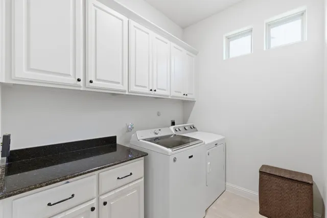 a view of a house with a yard porch and sitting area