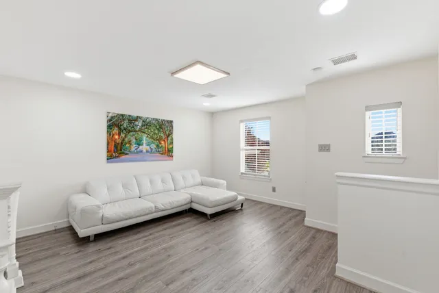 a view of a house with a yard porch and sitting area