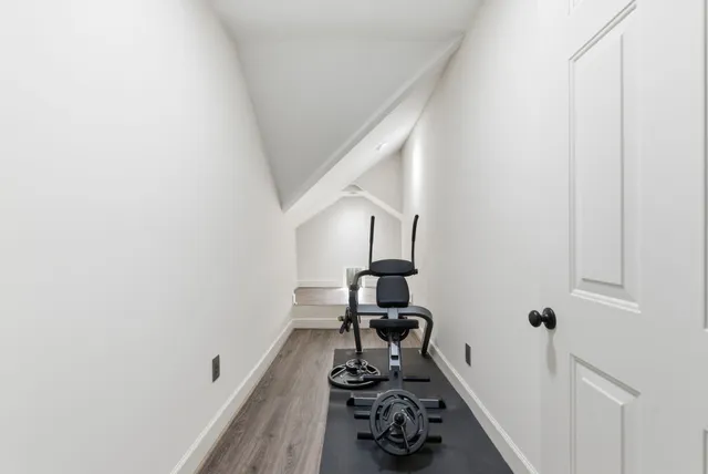a view of backyard with seating area and green space