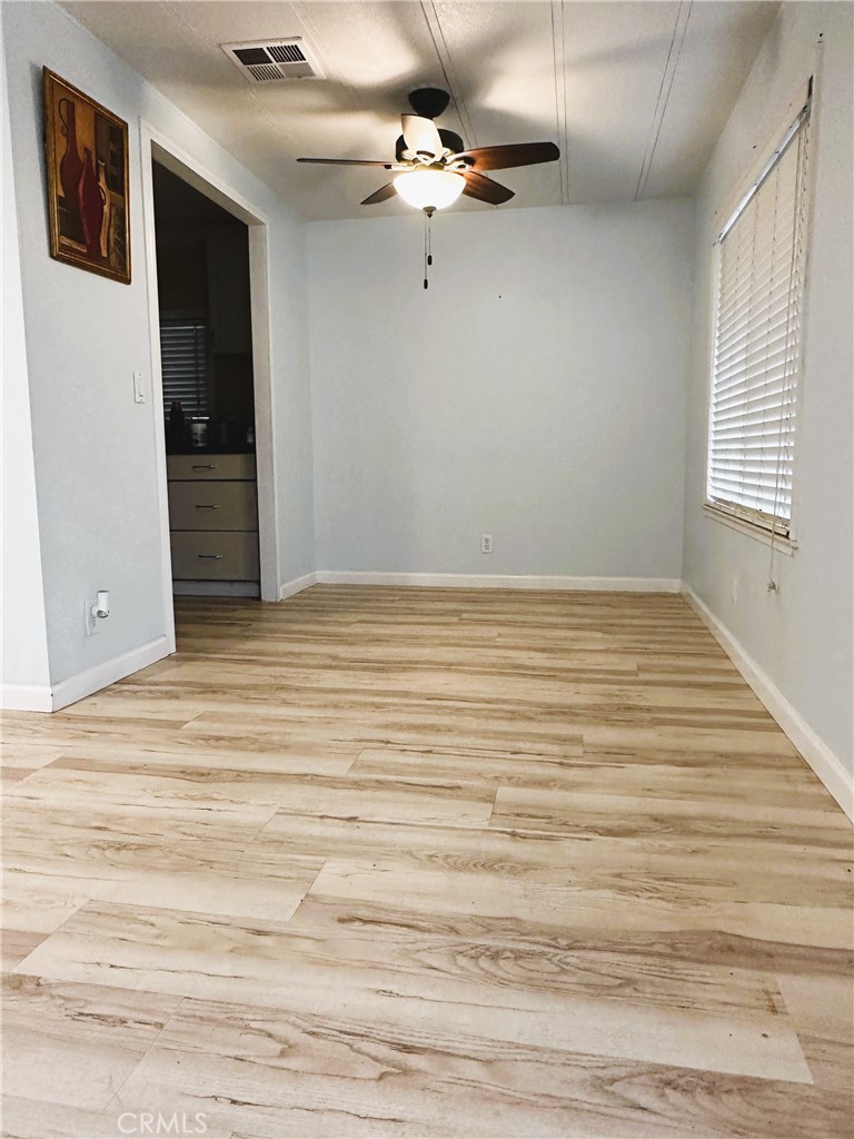 503 Corte Naranja, Unit 503 Rohnert Park, CA 94928 - Photo 3 of 16 wooden floor in an empty room