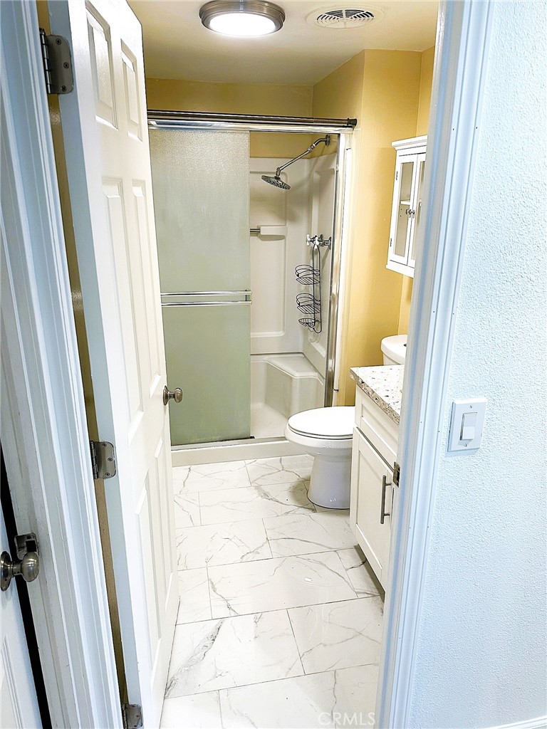 503 Corte Naranja, Unit 503 Rohnert Park, CA 94928 - Photo 8 of 16 a bathroom with a toilet and a shower