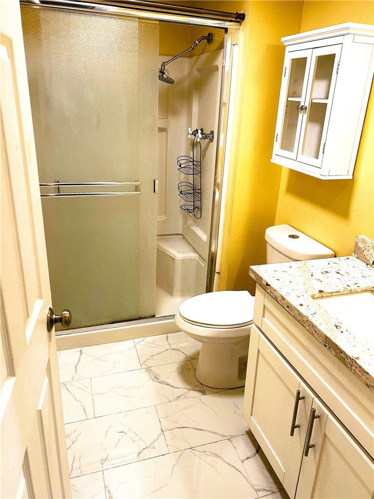 503 Corte Naranja, Unit 503 Rohnert Park, CA 94928 - Photo 9 of 16 a bathroom with a sink toilet and shower