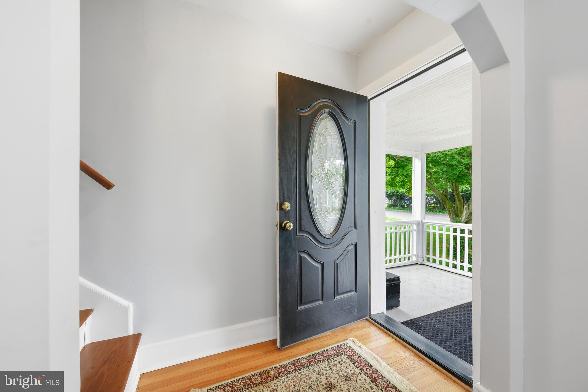 207 Crusader Road Cambridge, MD 21613 - Photo 12 of 76 a view of a hallway with wooden floor and a mirror
