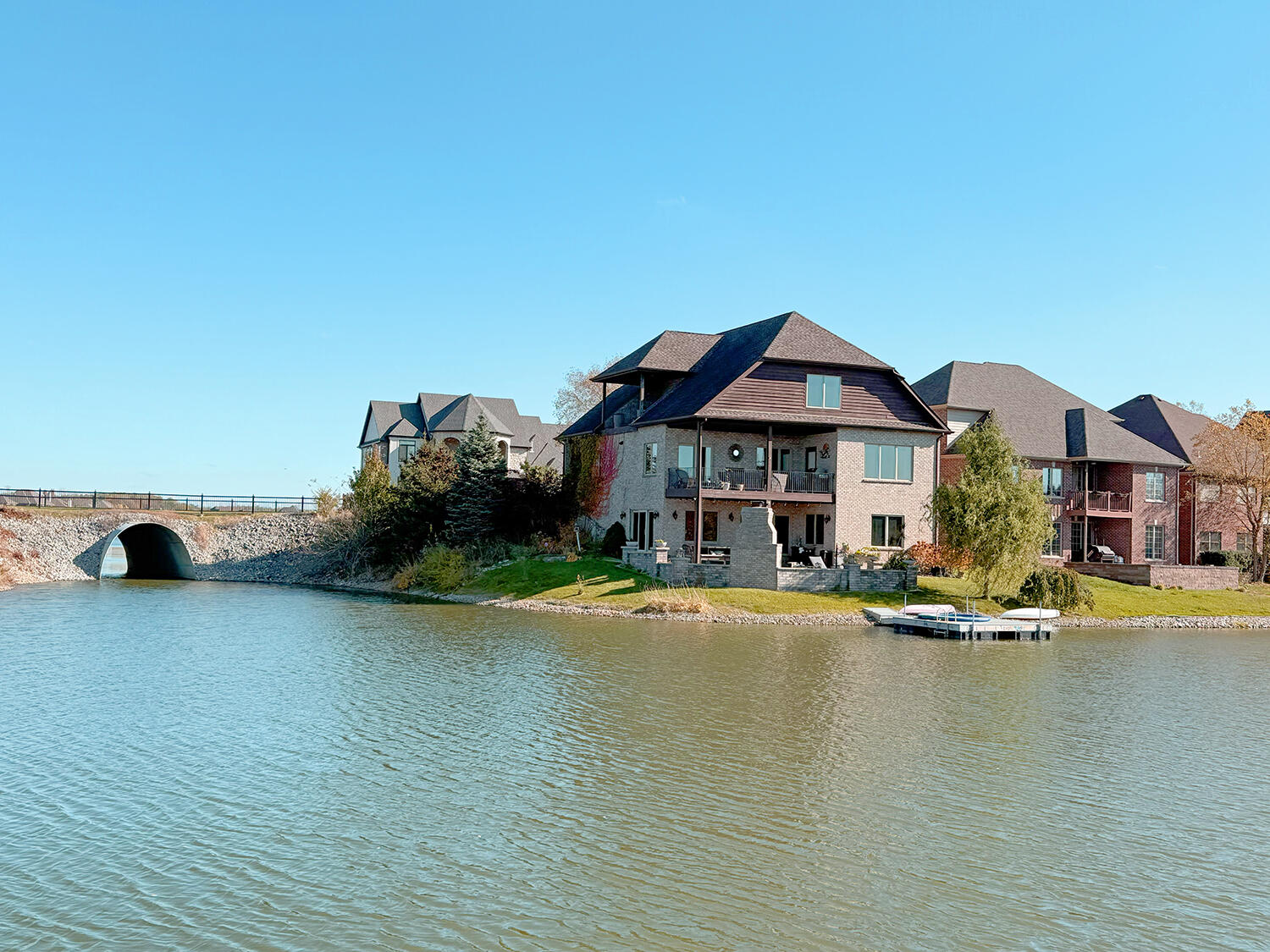 10380 Doubletree Drive South Crown Point, IN 46307 - Photo 2 of 80 a front view of a house with swimming pool having outdoor seating