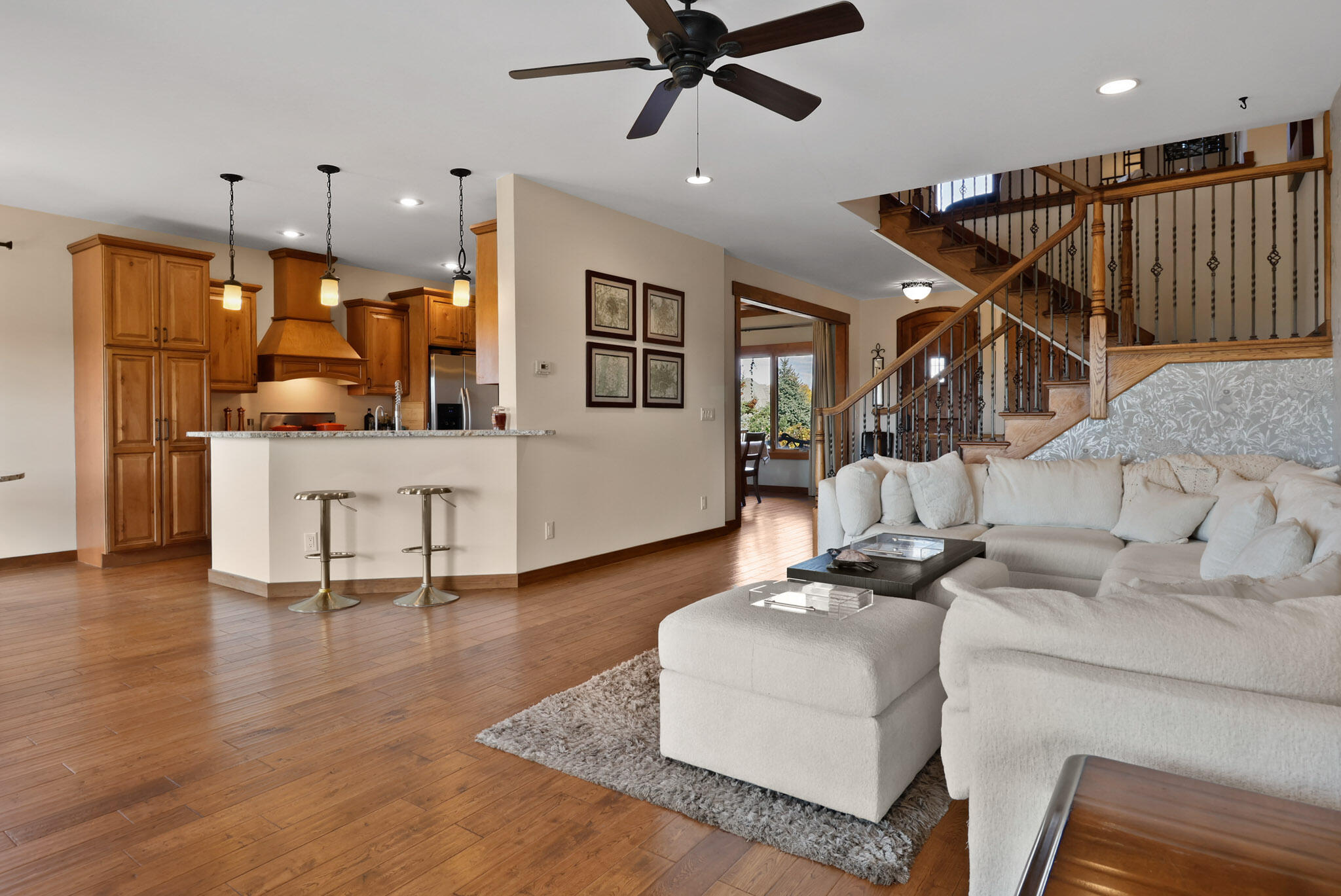 10380 Doubletree Drive South Crown Point, IN 46307 - Photo 24 of 80 a living room with furniture and kitchen view