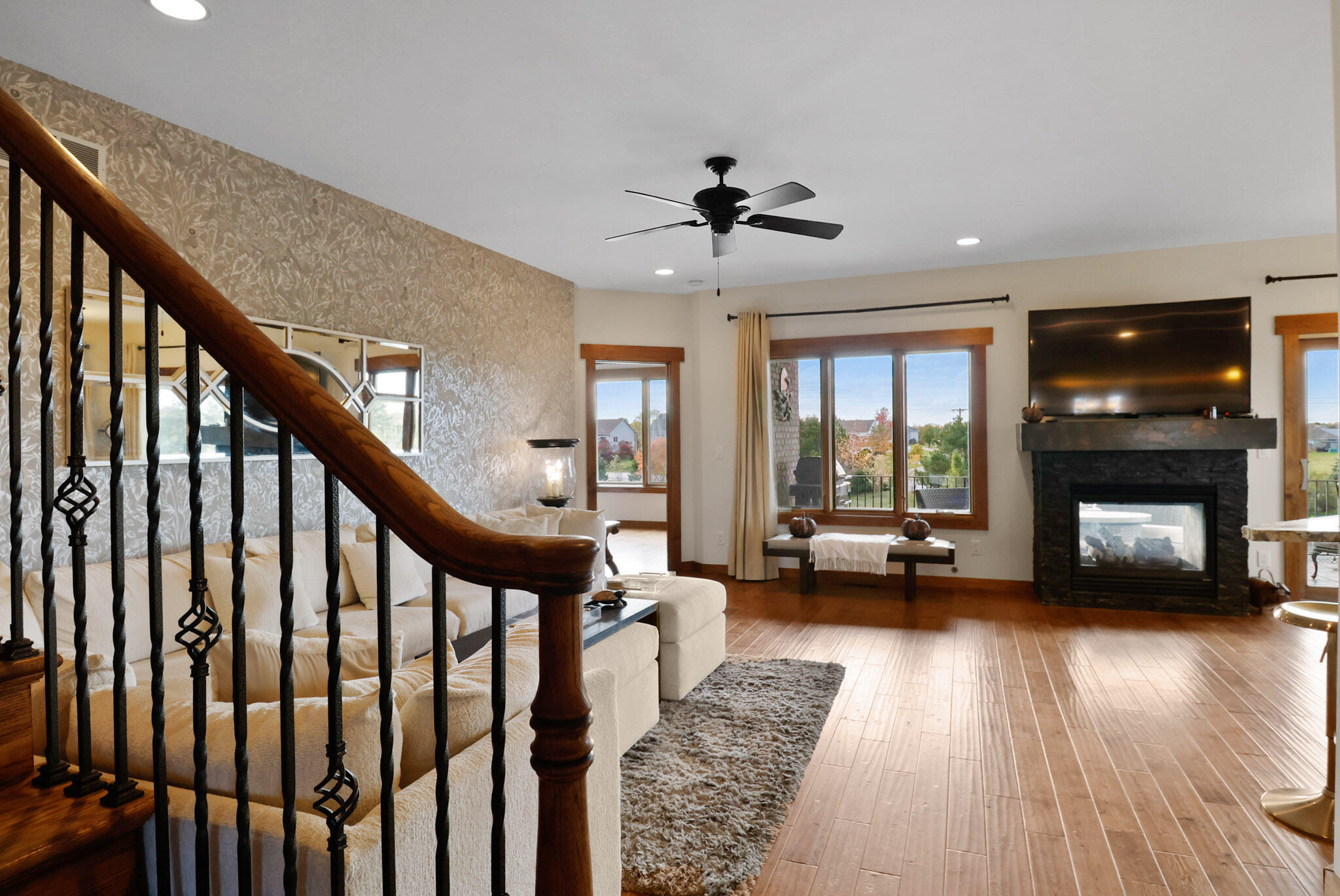10380 Doubletree Drive South Crown Point, IN 46307 - Photo 25 of 80 a living room with furniture and a fireplace