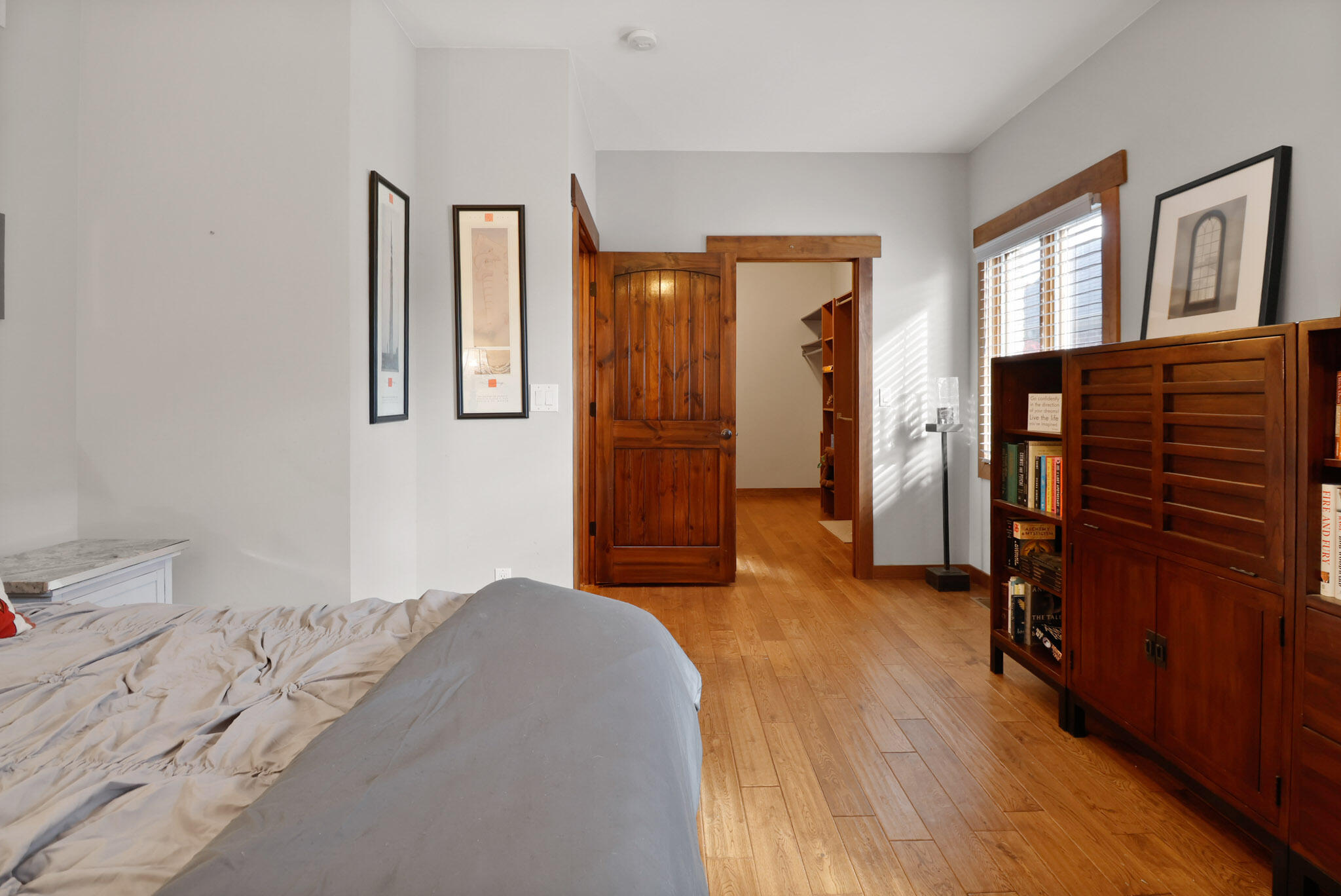 10380 Doubletree Drive South Crown Point, IN 46307 - Photo 32 of 80 a bedroom with a bed and wooden floor