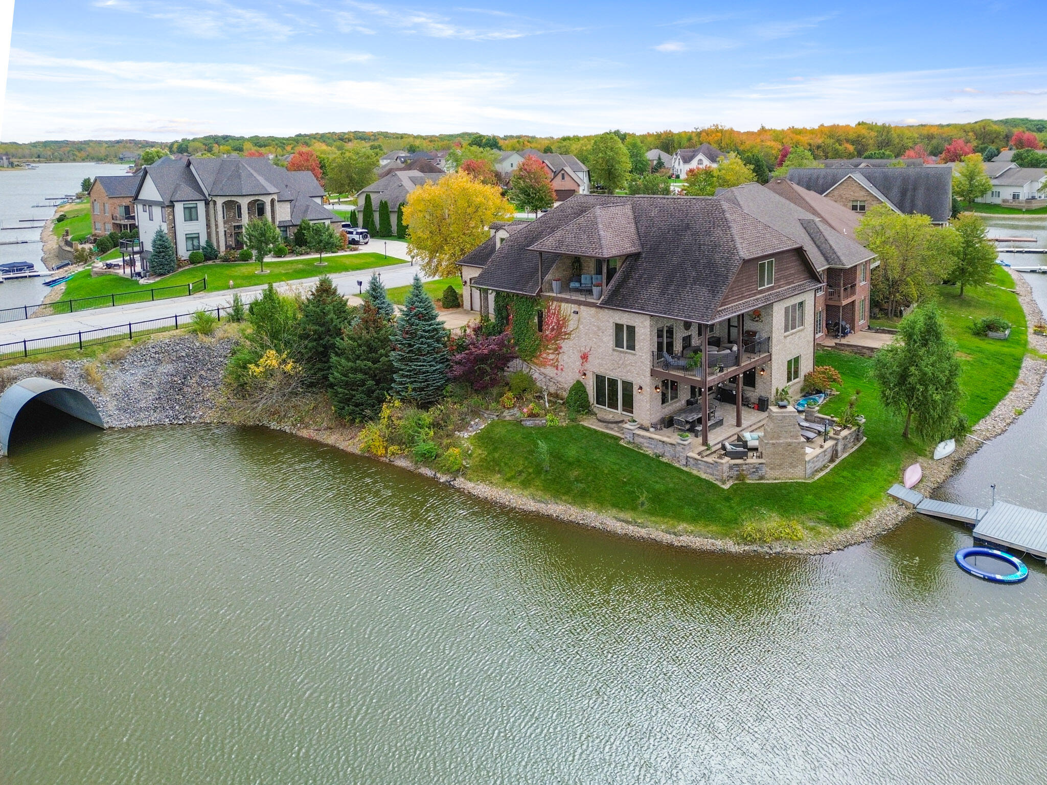10380 Doubletree Drive South Crown Point, IN 46307 - Photo 4 of 80 an aerial view of a house with a garden and lake view