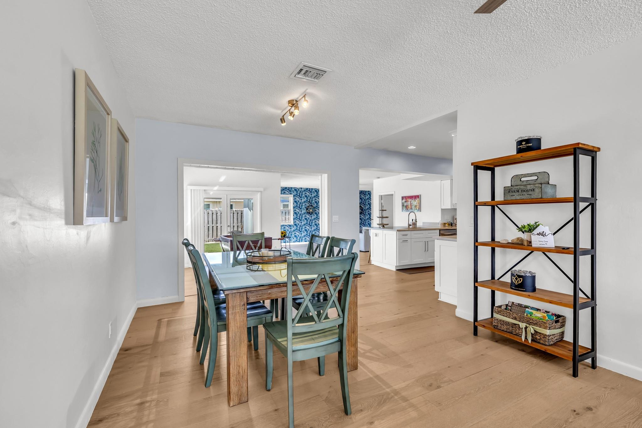 5211 Northeast 26th Avenue Lighthouse Point, FL 33064 - Photo 20 of 33 a view of a dining room with furniture