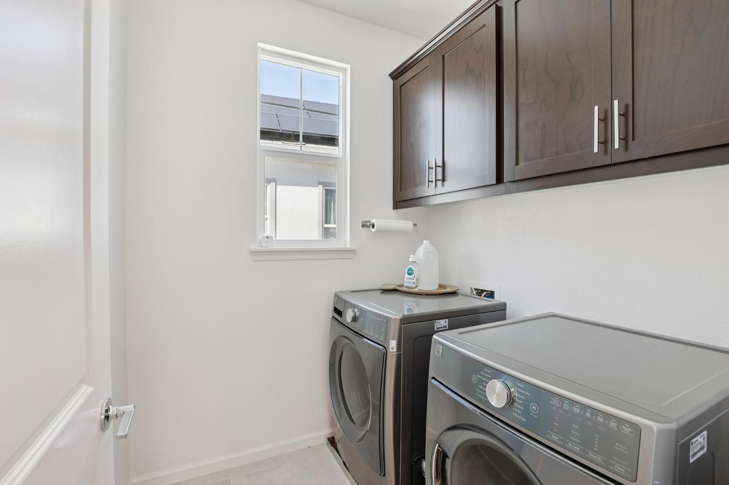 2413 Seaside Road Lathrop, CA 95330 - Photo 20 of 37 a utility room with dryer and washer